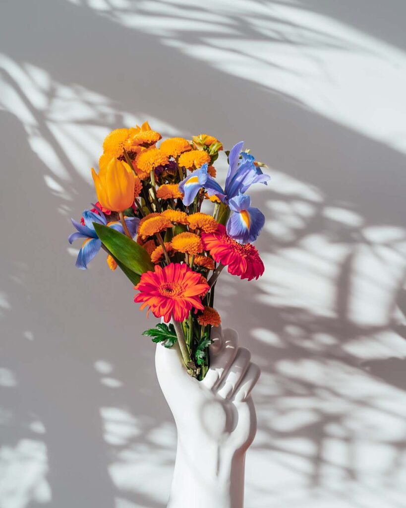 ceramic vase made in the shape of human hand with j5sssj6.jpg